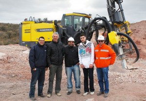 The PowerROC T35 with, from left, Pedro Arsenio, Atlas Copco Product Specialist, Federico Schroeder, General Manager, Minero San Pedro, Gabriel Joaquin, Product Manager, Atlas Copco, Martin Schroeder and Nicolas Vinés, of Michelotti e Hijos, one of the quarry’s many customers. 