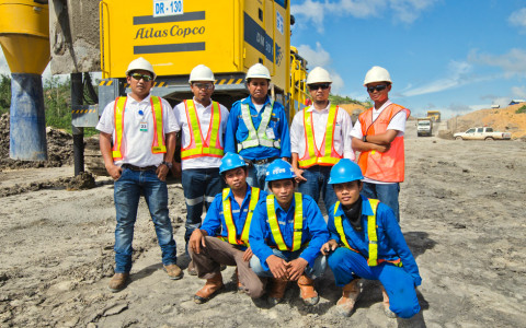 The drill crew of Nariki Minex Sajati pose for the camera during drilling at the Prima Sarana Gemilang coal mine on the Indonesian island of Kalimantran.