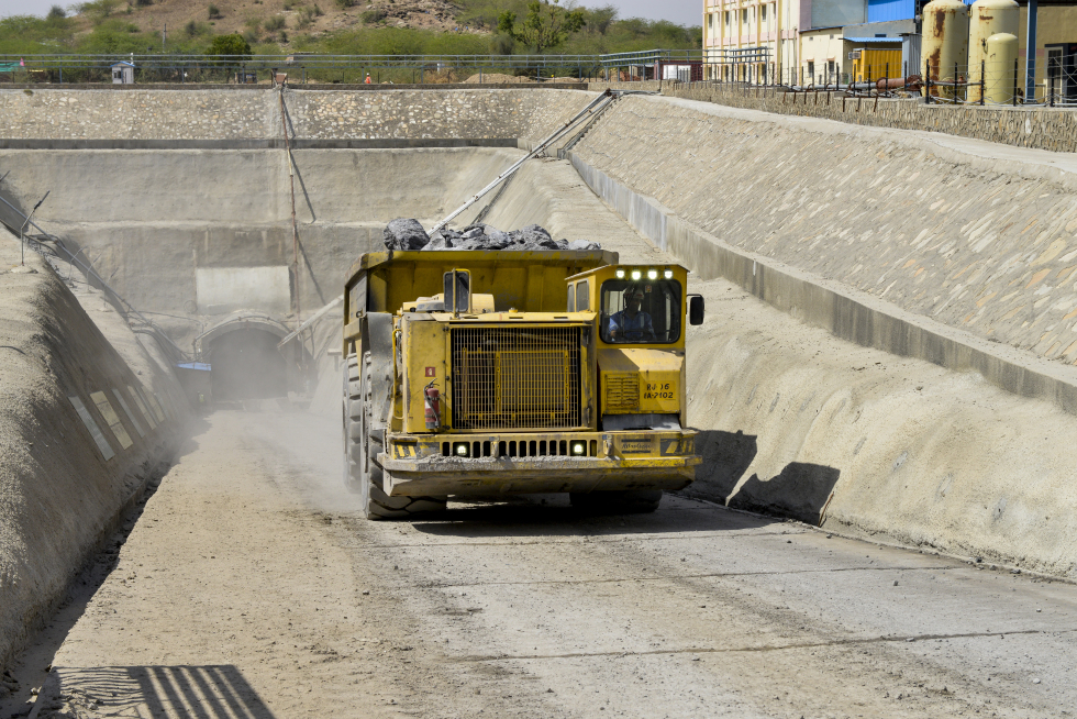 An Atlas Copco Minetruck MT5020 hauls out its load from the Kayad Mine.